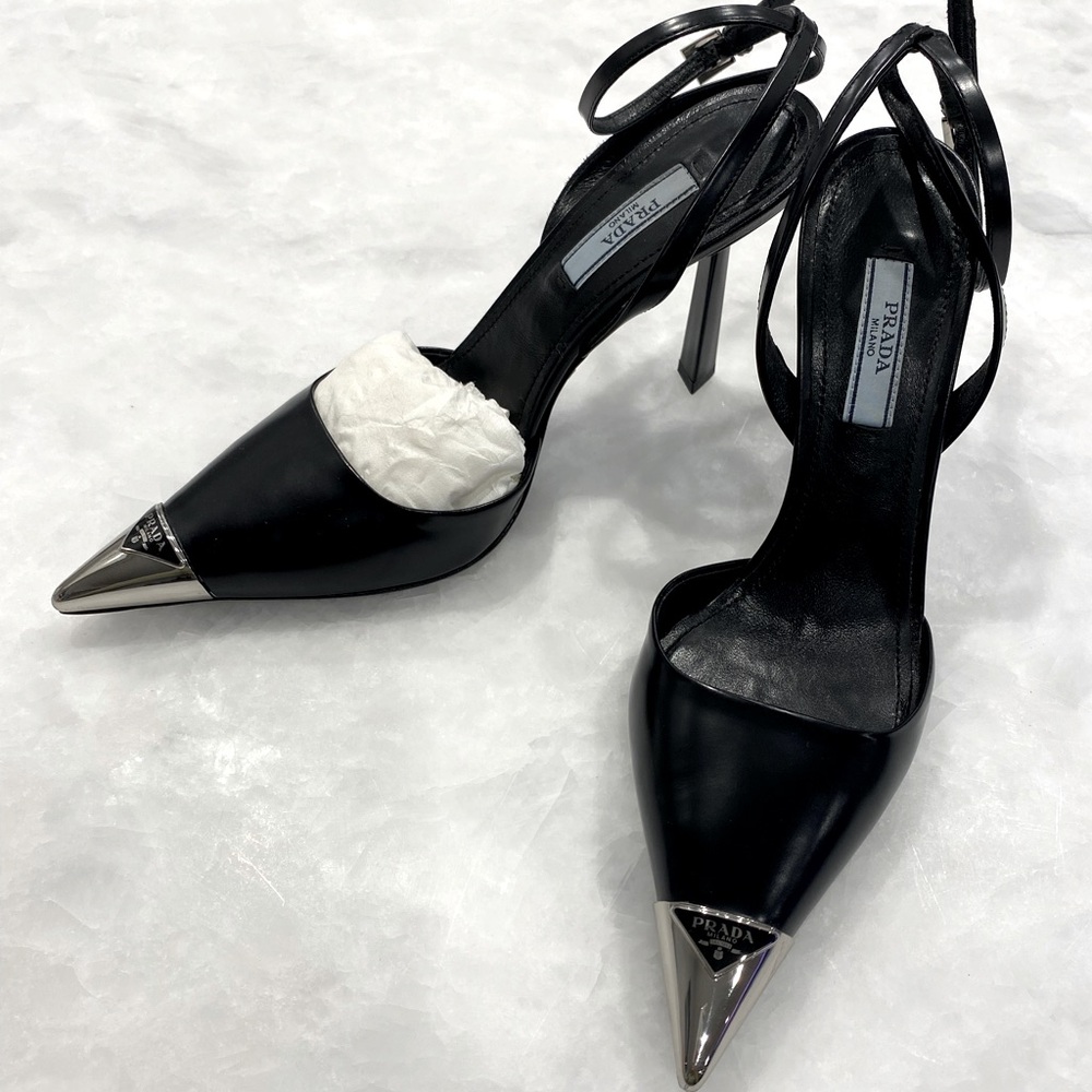 Prada
Prada Logo Plaque Pointed Toe Pumps
